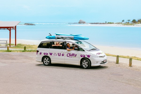 Chill'd Cloudbreak Campervan hire parked next to beach