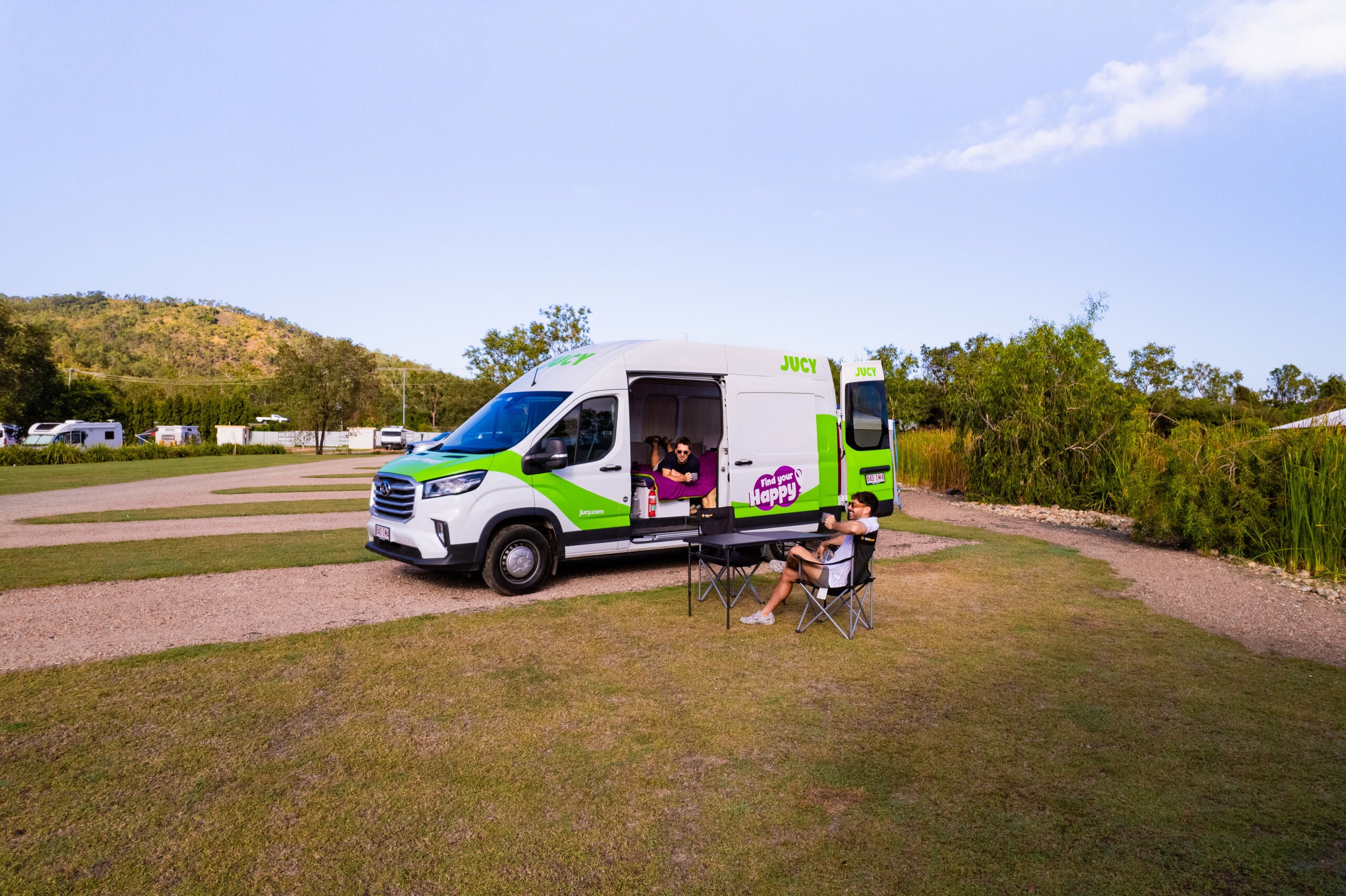 2 friends with Coaster Campervan