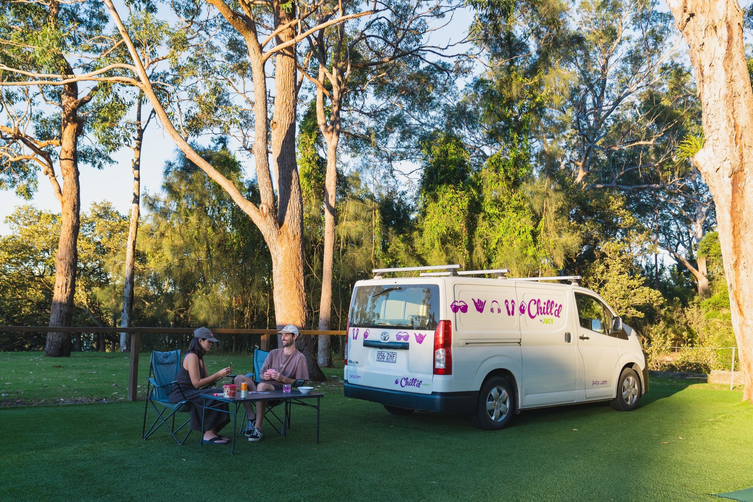 Adam and Clara with Malibu Campervan parked at Green Patch National Park