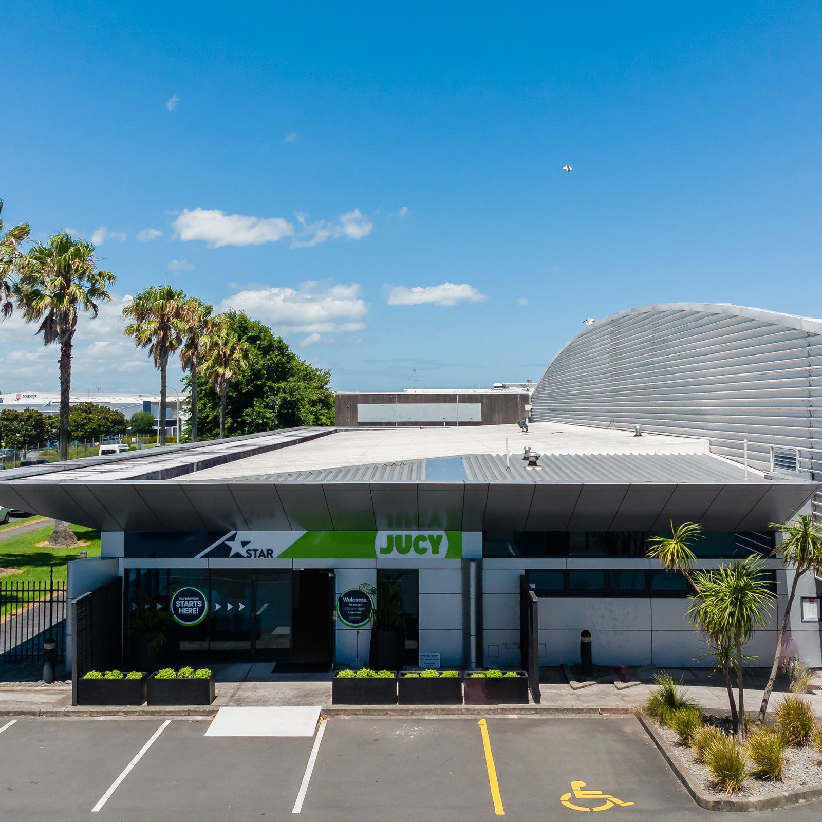 Front of JUCY Auckland Airport branch