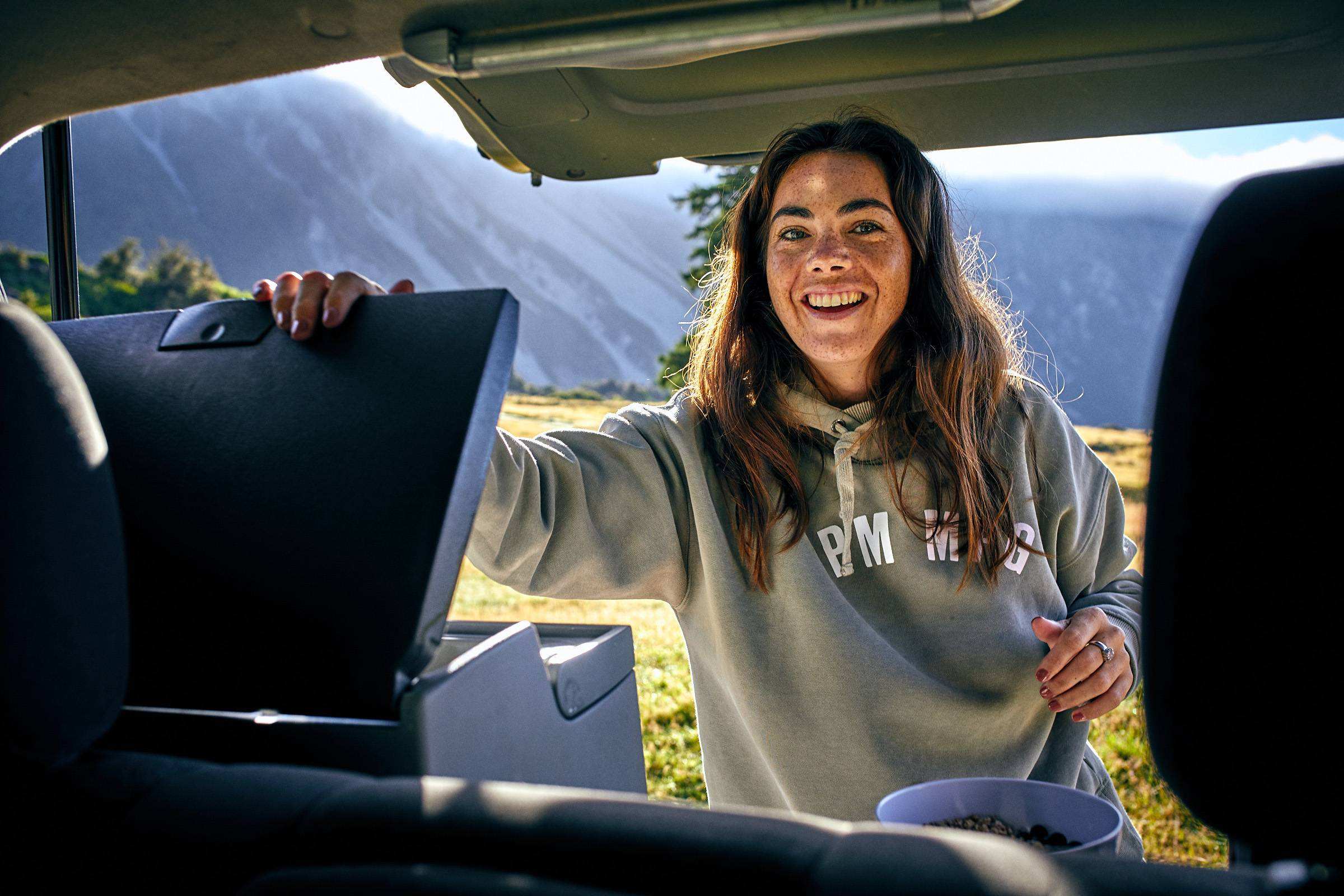Girl opening Chilld Cloudbreak fridge