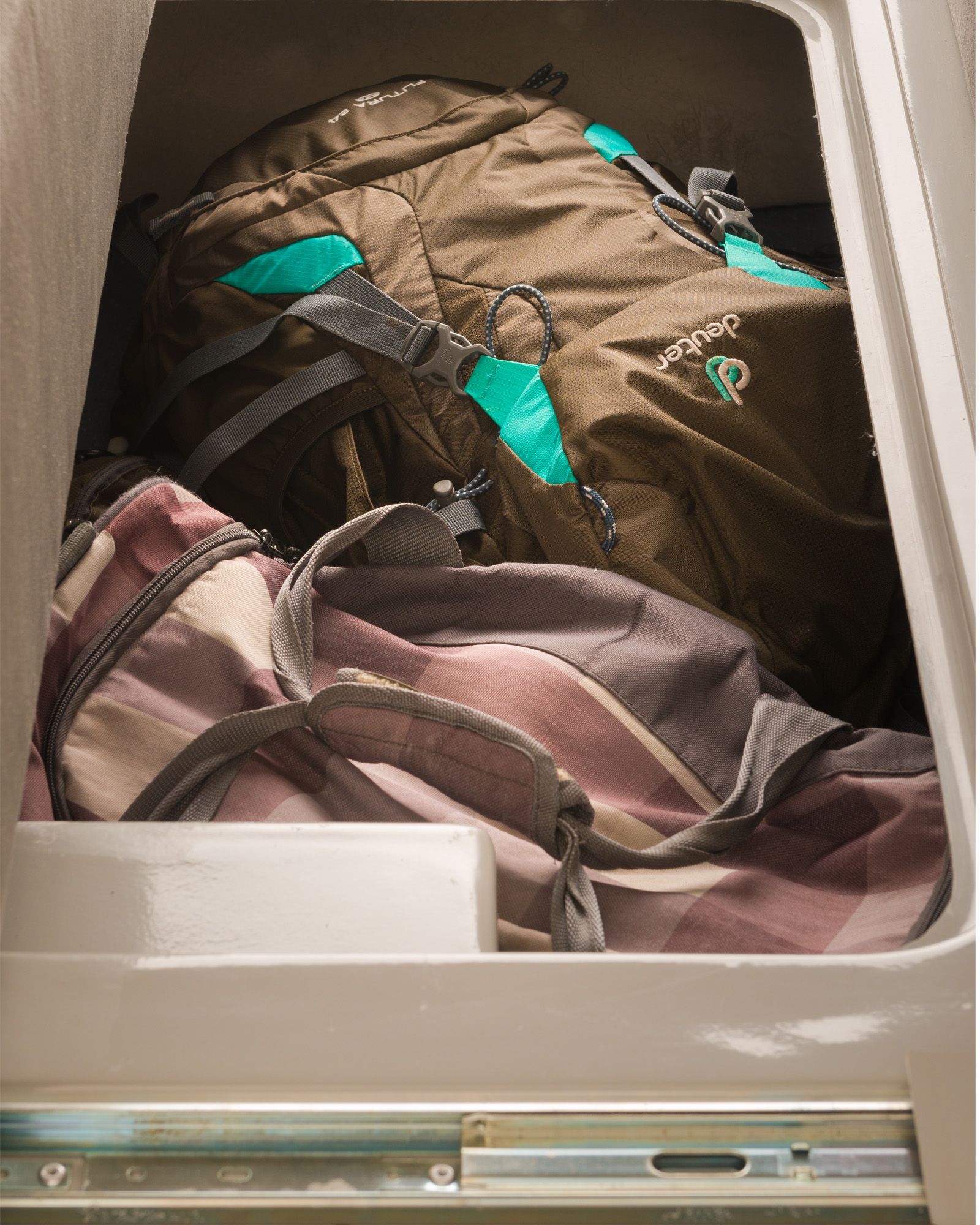 Storage - Storage space underneath bench seats. Soft bags fit best! 