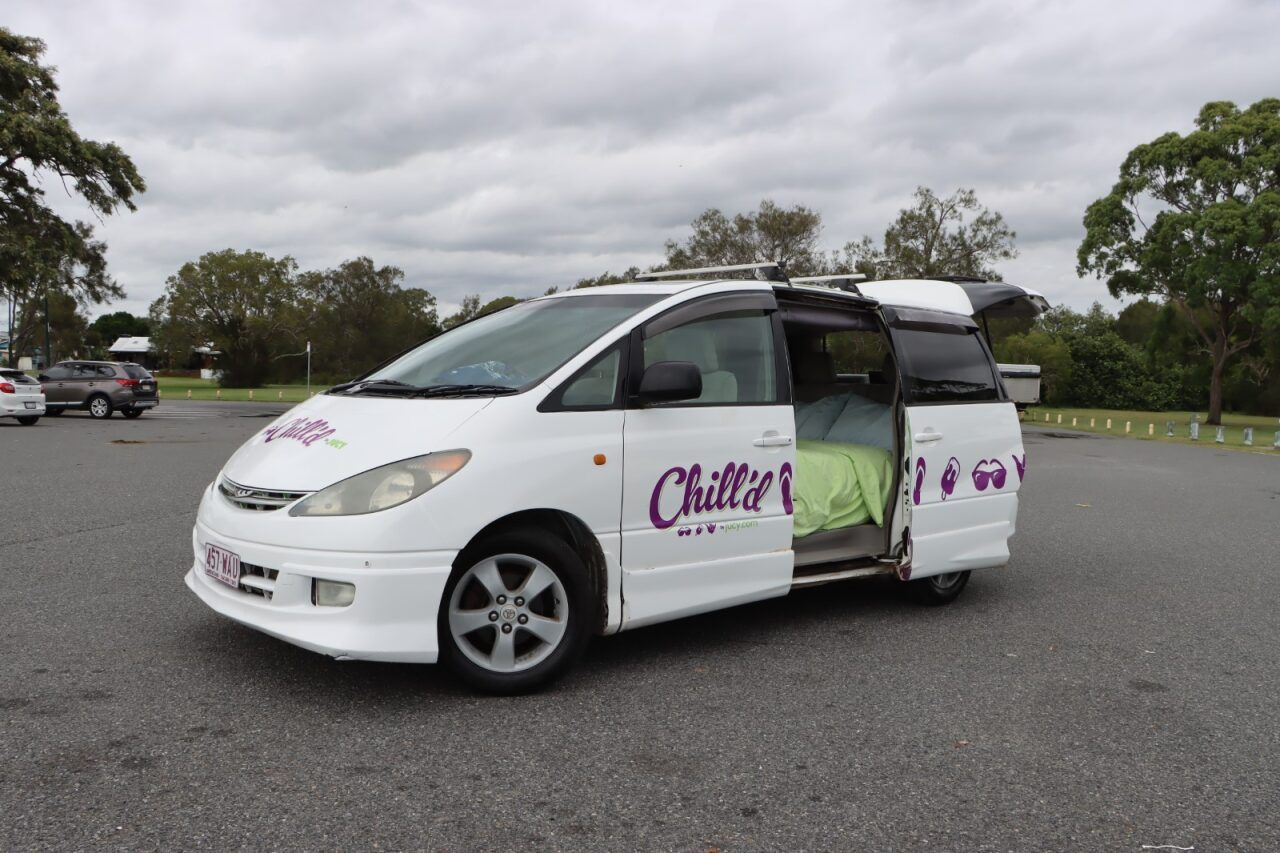 Cloudbreak campervan side shot with bed set up