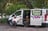 Adam and Clara enjoying drinks outside campervan at Green Patch nature park